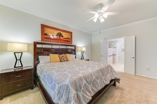 carpeted bedroom featuring ceiling fan, crown molding, and ensuite bath