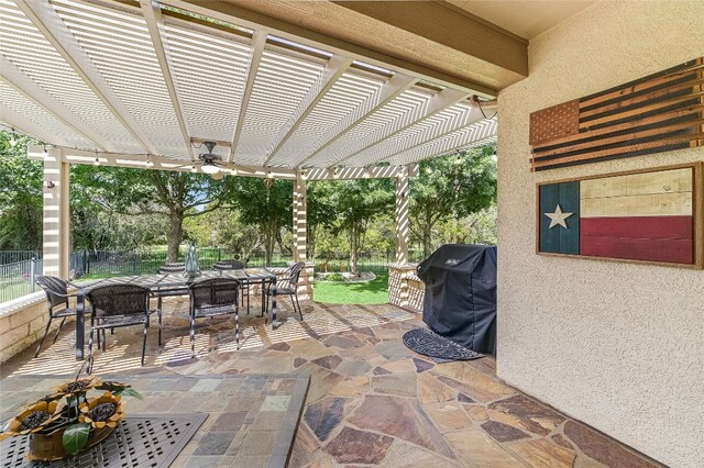 view of patio / terrace with a pergola and area for grilling