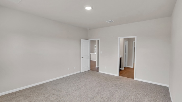 unfurnished bedroom featuring carpet flooring