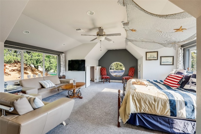 bedroom featuring carpet, lofted ceiling, and ceiling fan