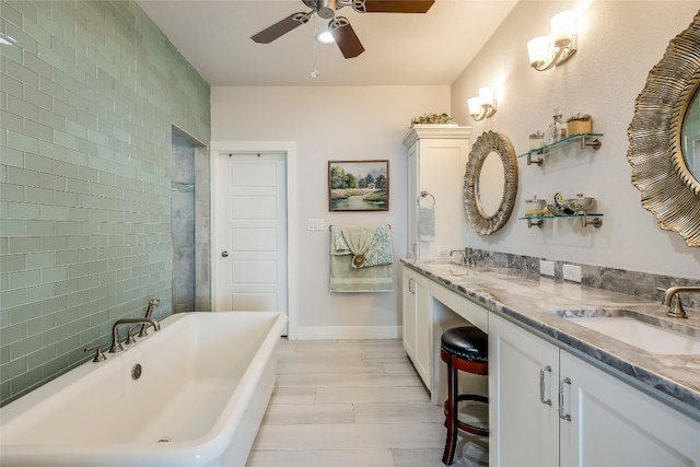 bathroom with ceiling fan, double vanity, and a bath