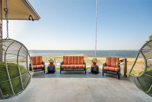 view of patio / terrace with a water view