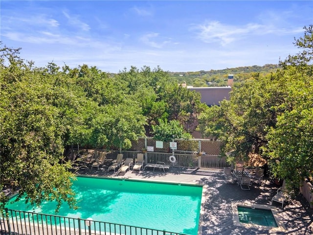 view of swimming pool featuring a patio