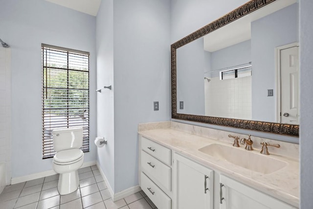 full bathroom with shower / bath combination, vanity, tile patterned floors, and toilet