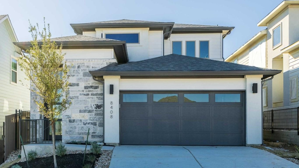 prairie-style house with a garage