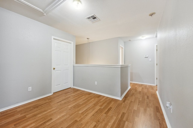 empty room featuring light hardwood / wood-style floors