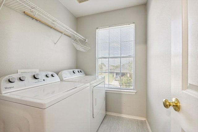 laundry room featuring independent washer and dryer