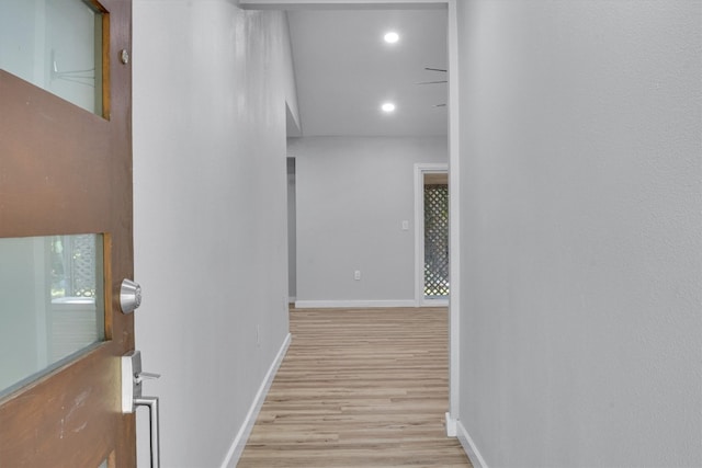 hallway featuring light wood-type flooring