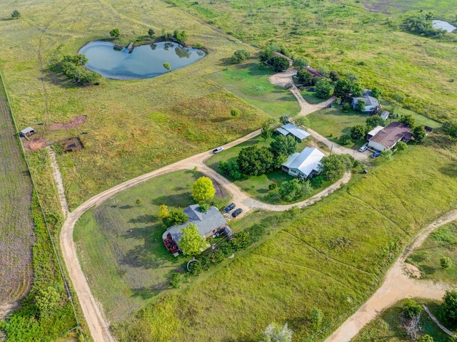 aerial view featuring a rural view and a water view