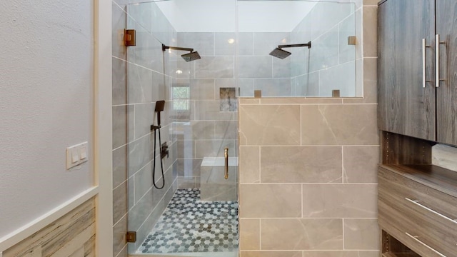 bathroom featuring an enclosed shower