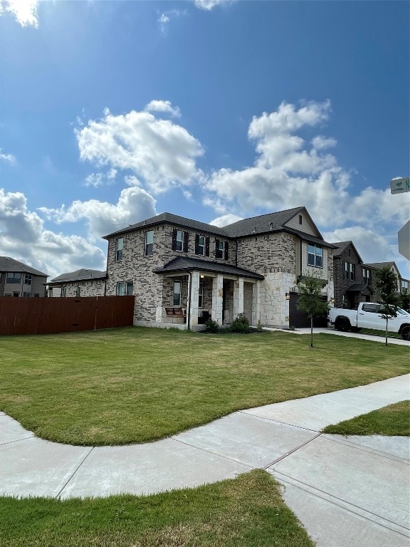 view of front of home with a front lawn