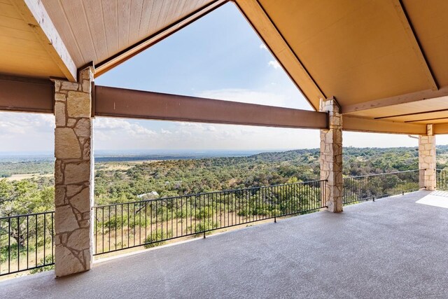 view of patio with a balcony