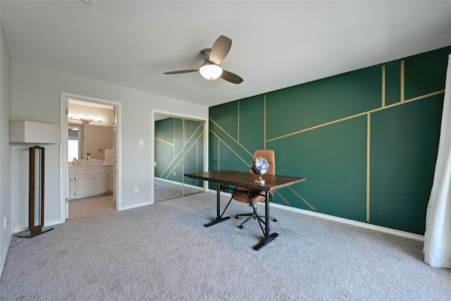 playroom featuring light carpet and ceiling fan