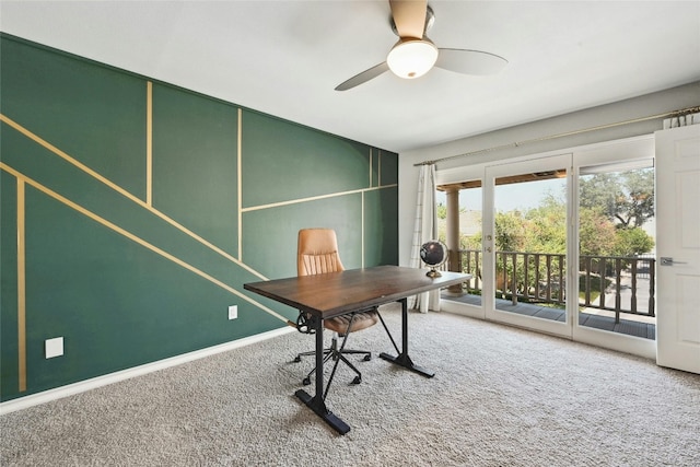 office with carpet floors and ceiling fan