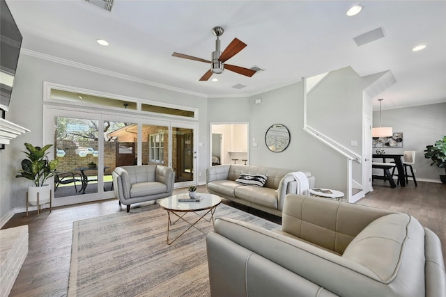 living room featuring ornamental molding, dark hardwood / wood-style flooring, and ceiling fan