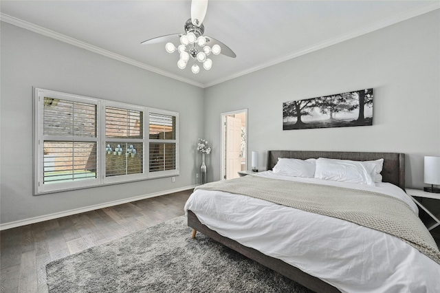 bedroom with ornamental molding, ceiling fan, and dark hardwood / wood-style flooring