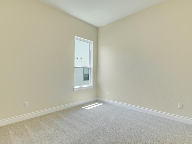 empty room featuring carpet floors