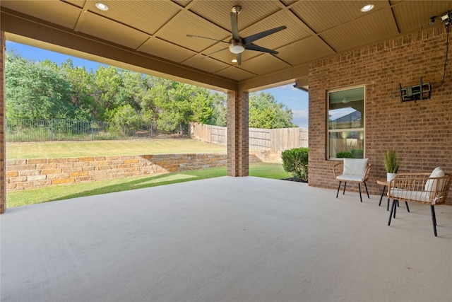 view of patio featuring ceiling fan