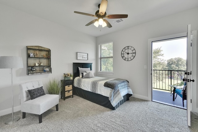 carpeted bedroom with ceiling fan and access to exterior