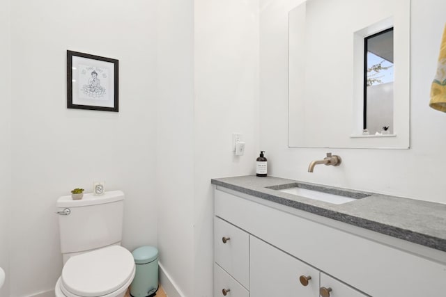 2118 Glendale Pl Unit 1, Austin, TX 78704 - bathroom with toilet, vanity, and baseboards
