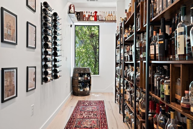 2118 Glendale Pl Unit 1, Austin, TX 78704 - wine room featuring wood finished floors and baseboards