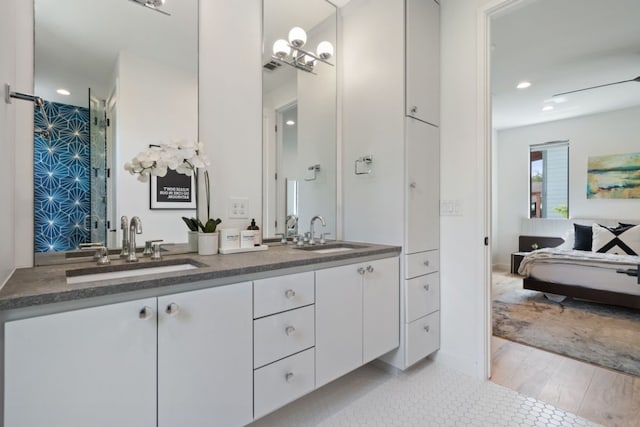 2118 Glendale Pl Unit 1, Austin, TX 78704 - bathroom featuring ensuite bath, double vanity, and recessed lighting