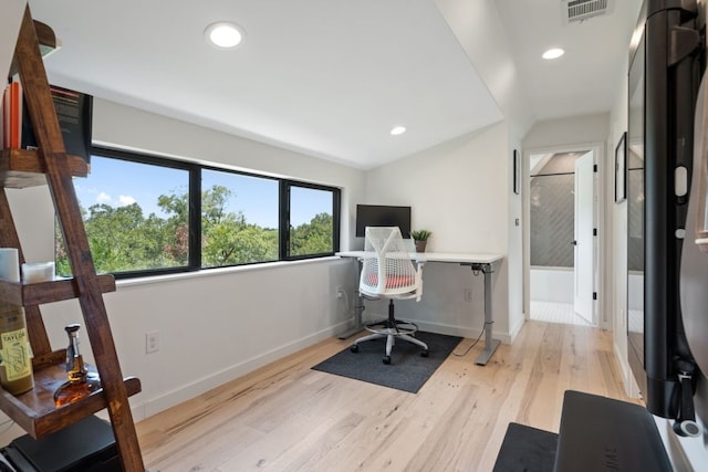 2118 Glendale Pl Unit 1, Austin, TX 78704 - home office with wood finished floors, recessed lighting, baseboards, and vaulted ceiling