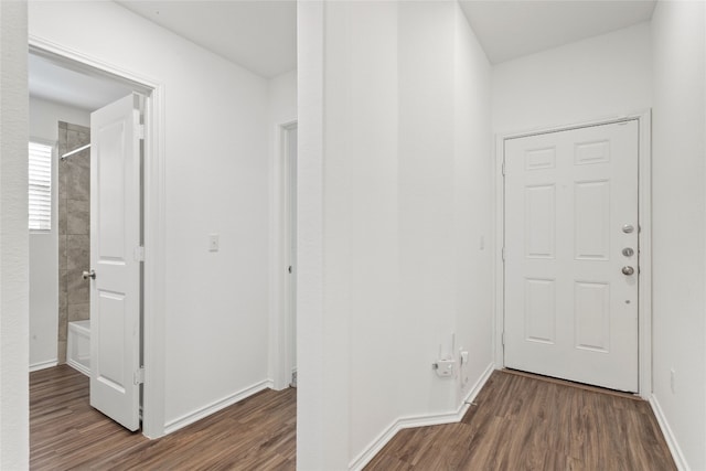 hallway featuring dark hardwood / wood-style floors