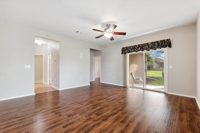 unfurnished room with ceiling fan and hardwood / wood-style flooring