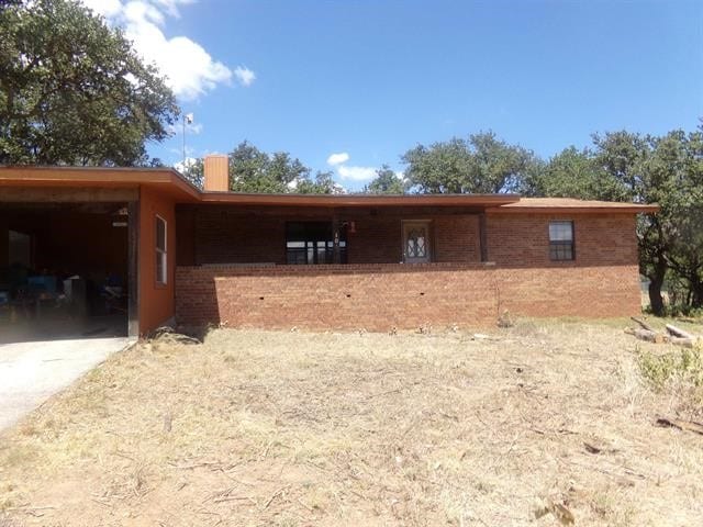 view of front of house with a carport