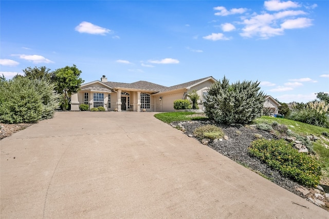 ranch-style house with a garage