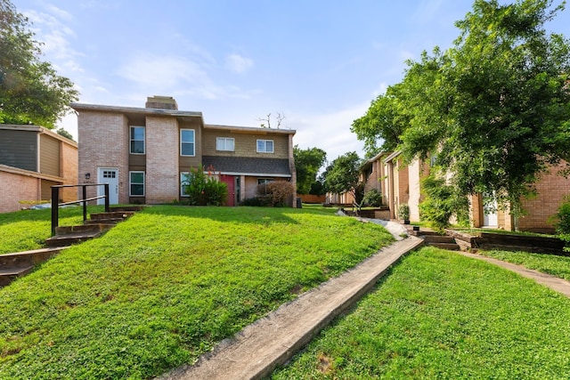 exterior space featuring a lawn