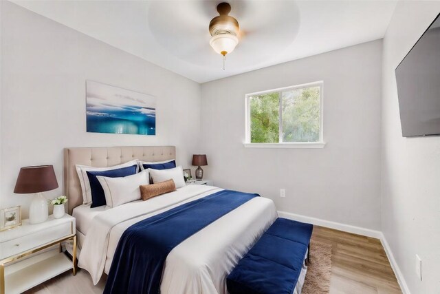 bedroom featuring ceiling fan and light wood-type flooring