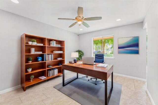 tiled office space with ceiling fan