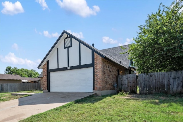 view of front facade with a garage and a front yard