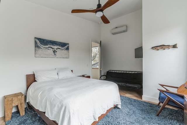 107 Blue Ridge Trl, Austin, TX 78746 - bedroom featuring a wall mounted AC, lofted ceiling, wood finished floors, a ceiling fan, and baseboards
