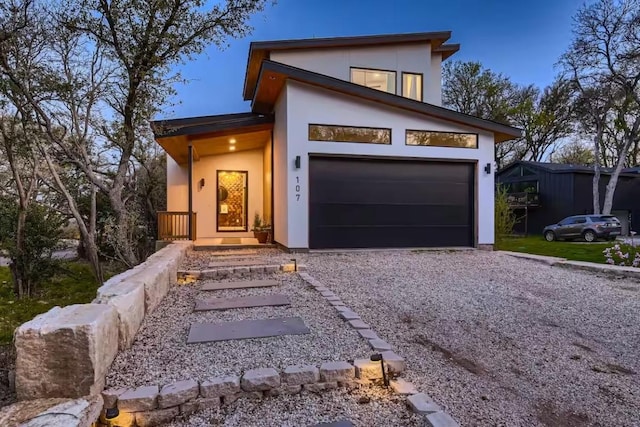 107 Blue Ridge Trl, Austin, TX 78746 - modern home with driveway and stucco siding