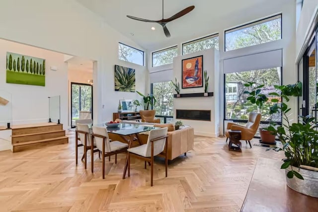 107 Blue Ridge Trl, Austin, TX 78746 - dining space with a high ceiling, ceiling fan, plenty of natural light, recessed lighting, and baseboards