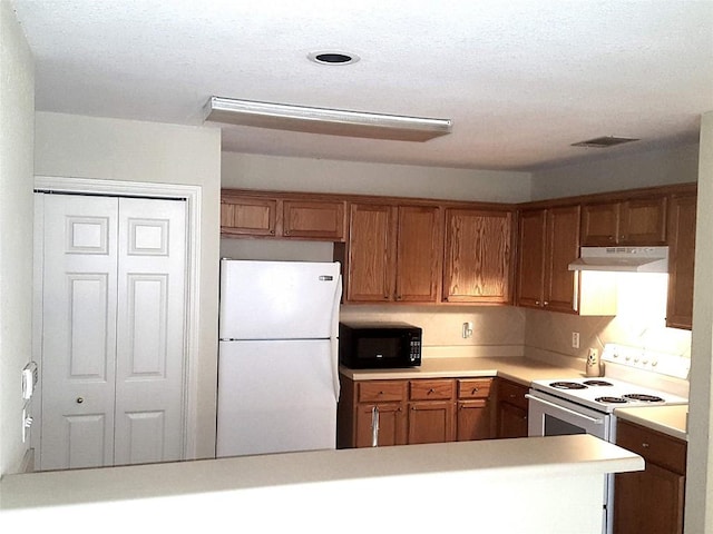 kitchen with white appliances