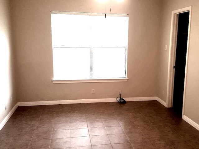 view of tiled spare room