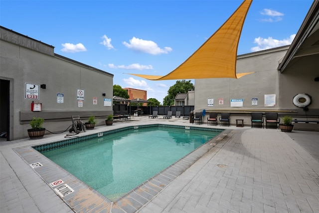 view of pool with a patio area