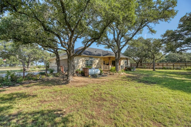 view of yard featuring fence