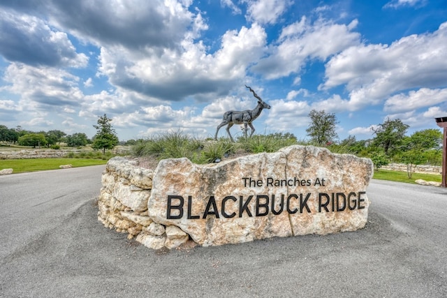 view of community sign