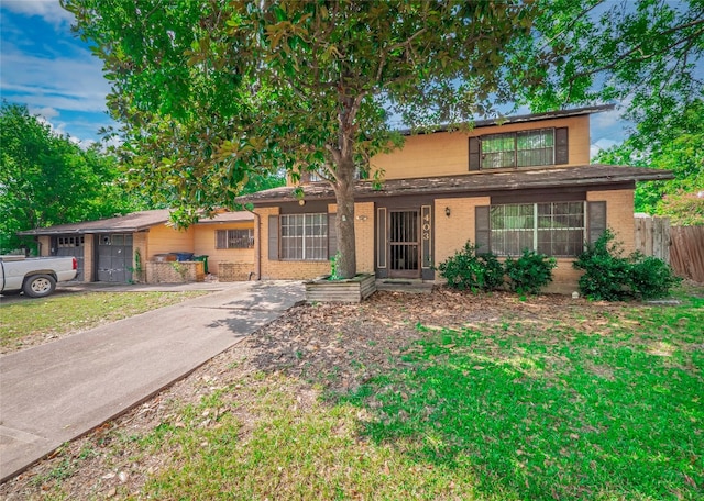 view of front of property featuring a garage