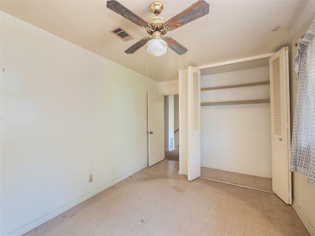 unfurnished bedroom with baseboards, visible vents, a ceiling fan, light floors, and a closet