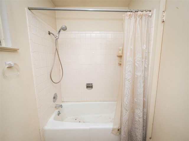 full bathroom featuring shower / bath combination with curtain