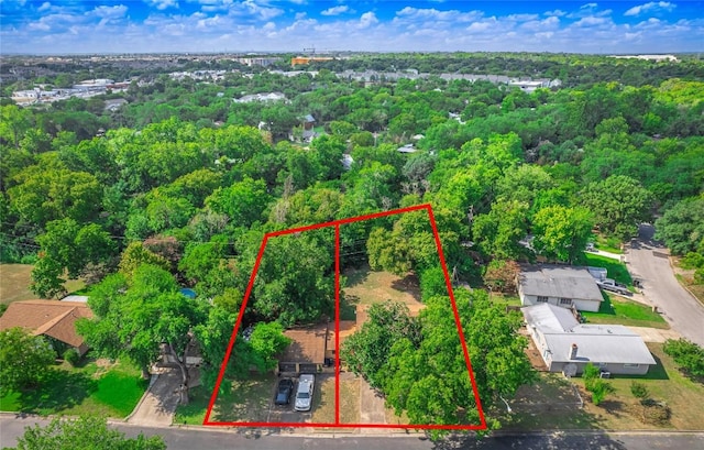403AND401 Ramble Ln, Austin, TX 78745 - view of property location with property boundaries highlighted and a heavily wooded area