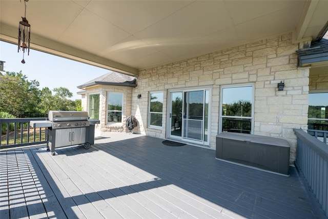 wooden deck with grilling area