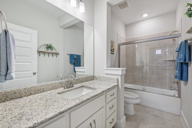 full bathroom with vanity, toilet, enclosed tub / shower combo, and tile patterned flooring