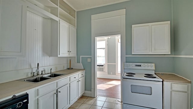 kitchen featuring white electric stove, light tile patterned floors, white cabinetry, a sink, and dishwashing machine